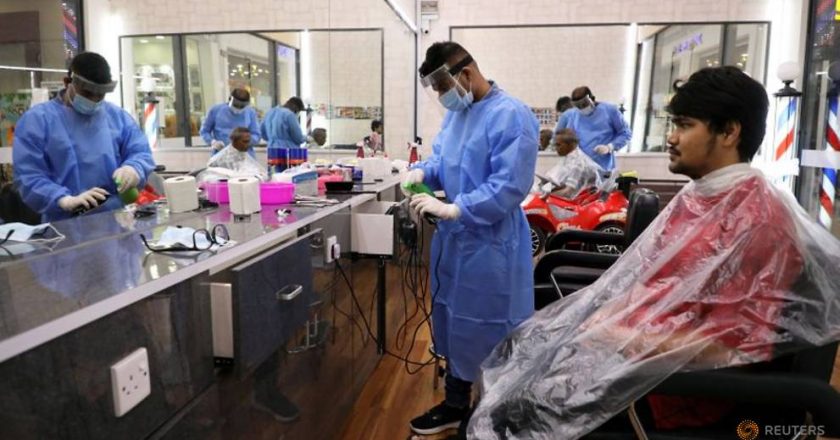 Malaysia resumes travel, haircuts and retail therapy as coronavirus curbs ease