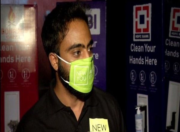 Srinagar bizman develops hands-free sanitizer dispensing stand