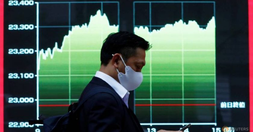 Asia shares pare losses as China GDP pips forecasts
