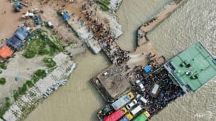 Bangladeshis rush back to work as factories reopen despite COVID-19 surge