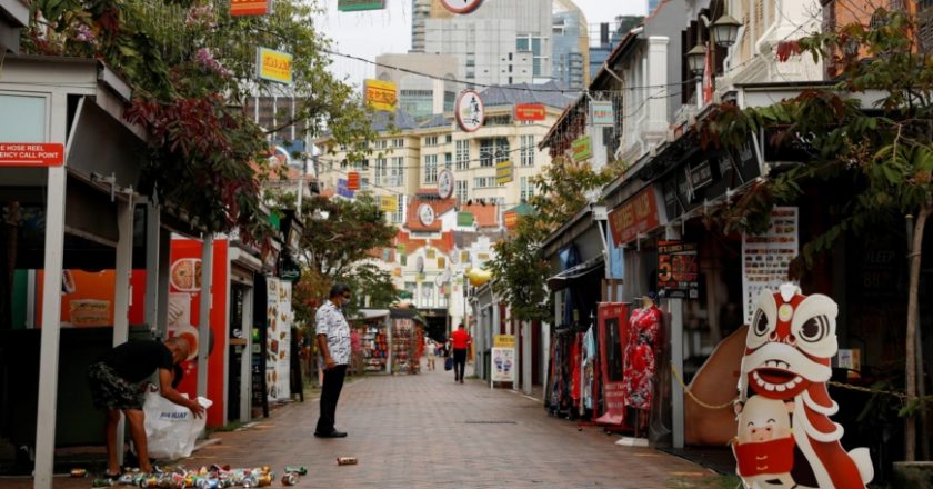 Vaccinated Singapore eases into reopening as other nations watch for lessons