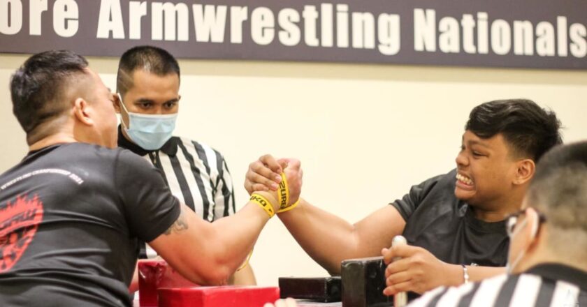 Flexing muscles to grow the sport: Singapore’s arm wrestlers face off at first national championships