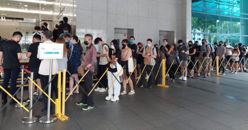 ‘I have a backache now’: People wait for hours to collect passports at ICA building