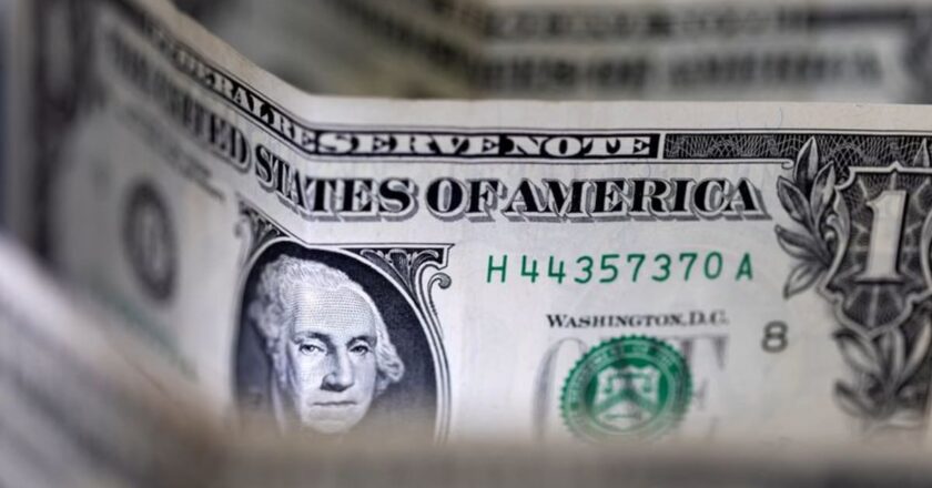 Dollar towering, stocks cowering as Fed hikes higher